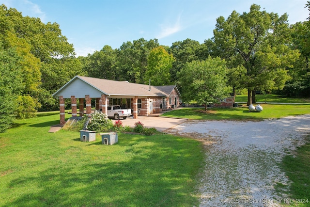 view of front of house with a front lawn