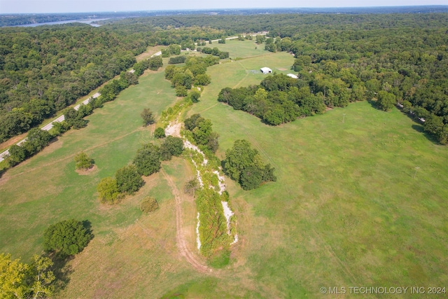 birds eye view of property featuring a rural view