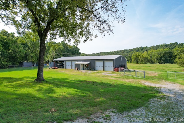 view of yard featuring a garage