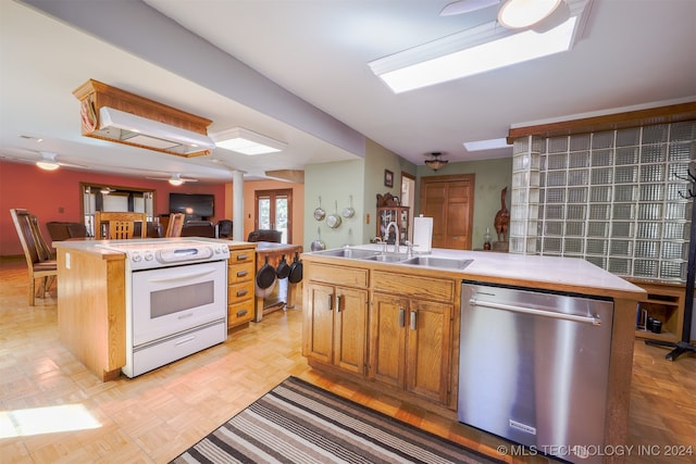 kitchen with stainless steel dishwasher, white range with electric cooktop, sink, and an island with sink