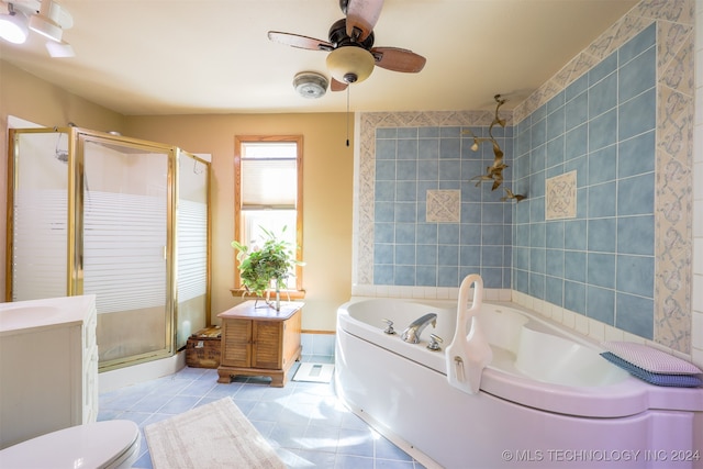 full bathroom with ceiling fan, toilet, vanity, plus walk in shower, and tile patterned flooring