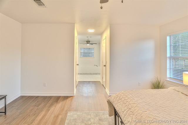 bedroom featuring hardwood / wood-style floors and ceiling fan