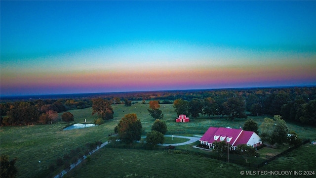 aerial view at dusk with a rural view