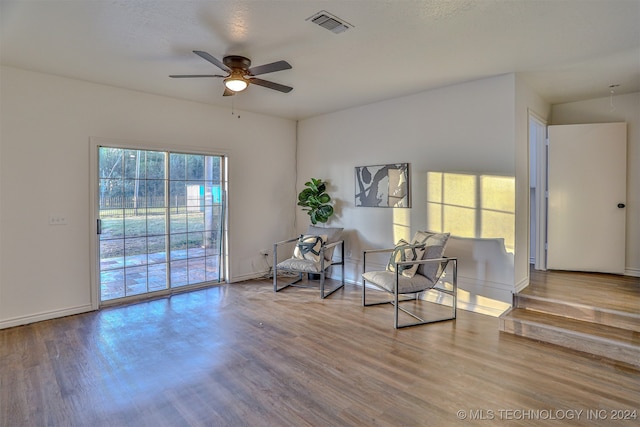 unfurnished room featuring ceiling fan and hardwood / wood-style floors