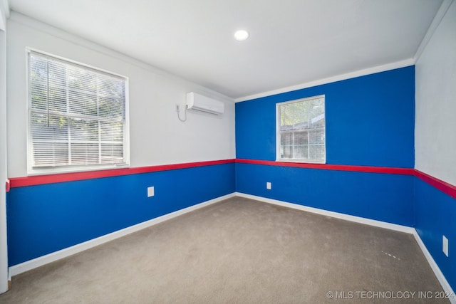 carpeted empty room with ornamental molding and a wall unit AC