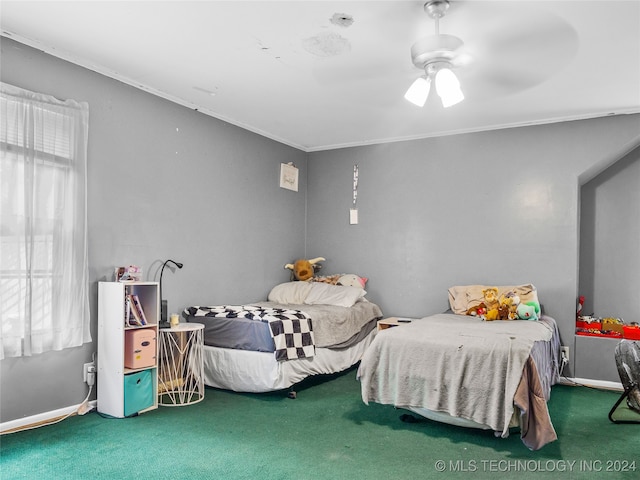 carpeted bedroom featuring multiple windows, crown molding, and ceiling fan