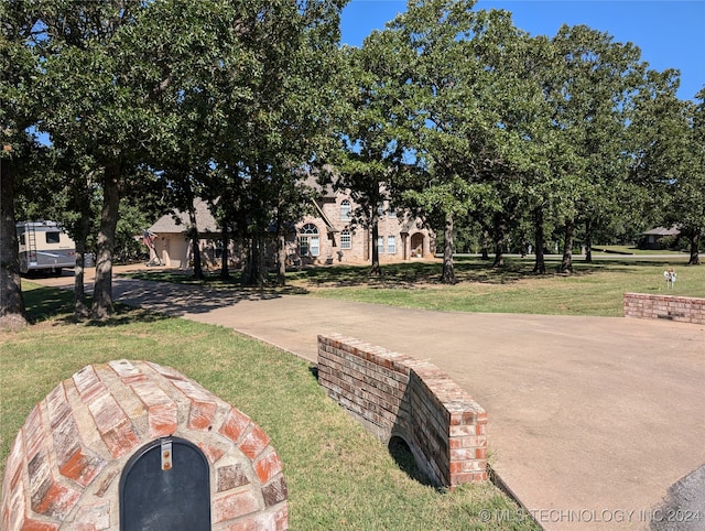 exterior space featuring a front lawn