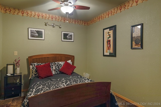 bedroom featuring ceiling fan