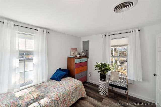 bedroom featuring dark hardwood / wood-style floors