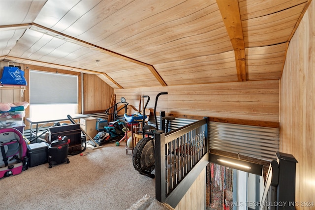 bonus room featuring lofted ceiling, carpet floors, wooden walls, and wooden ceiling