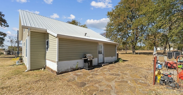 view of home's exterior featuring a patio area