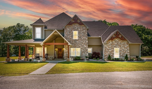 view of front of property with a lawn