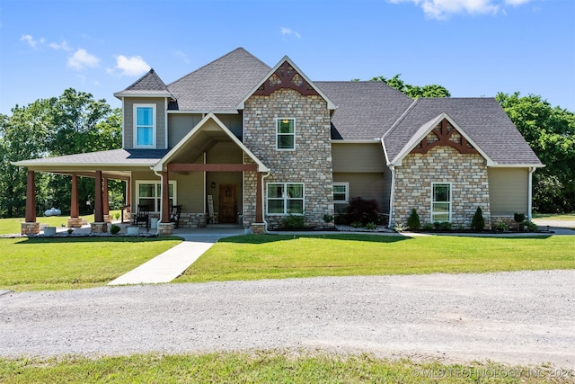 craftsman inspired home with a front yard