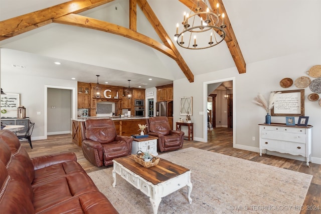 living room with high vaulted ceiling, hardwood / wood-style flooring, beamed ceiling, and a chandelier