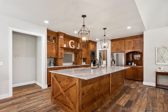 kitchen featuring a large island, pendant lighting, dark wood-type flooring, and stainless steel appliances