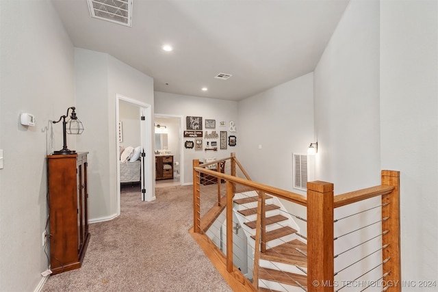 corridor featuring carpet floors