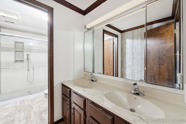 bathroom with toilet, tile patterned flooring, a shower, crown molding, and vanity