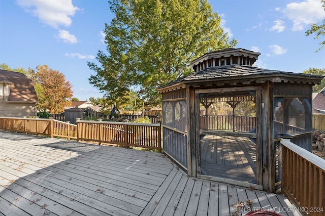 wooden deck with a gazebo