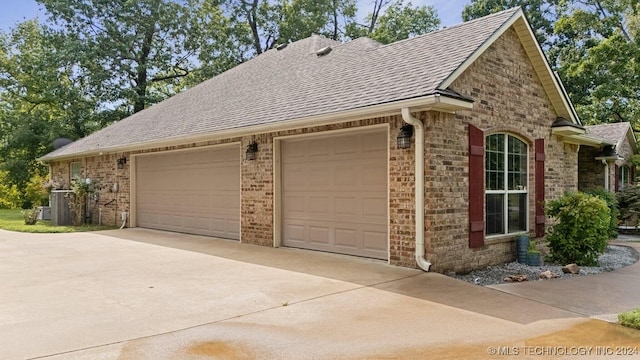 view of home's exterior with a garage