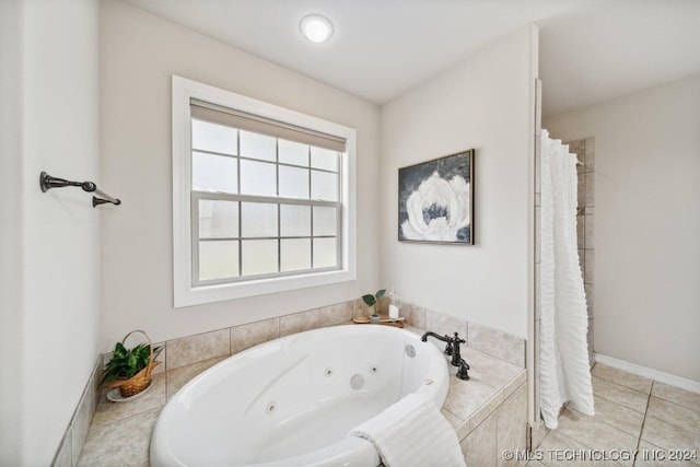 bathroom with plus walk in shower and tile patterned flooring