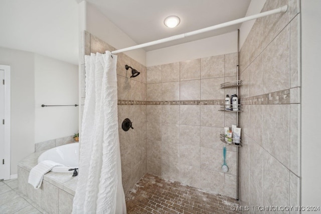 bathroom featuring plus walk in shower