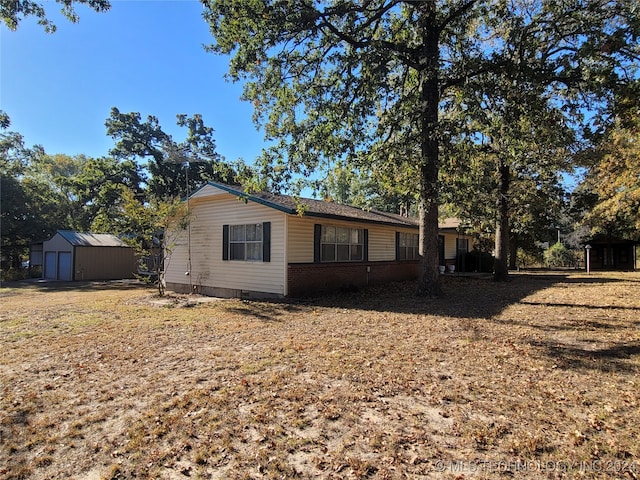 exterior space featuring a shed