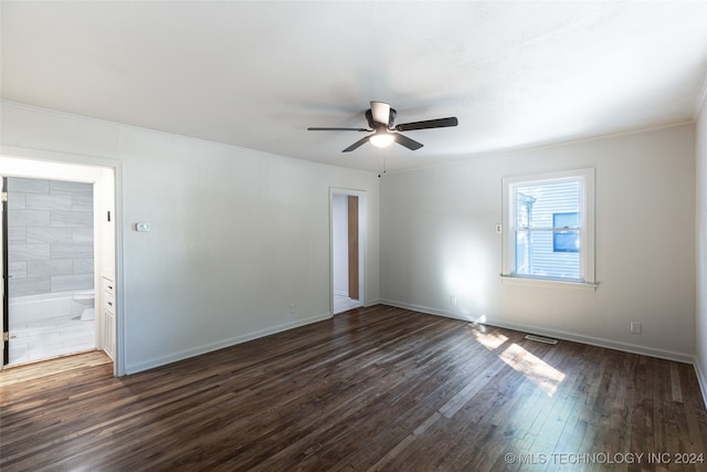 unfurnished room featuring ornamental molding, dark hardwood / wood-style floors, and ceiling fan