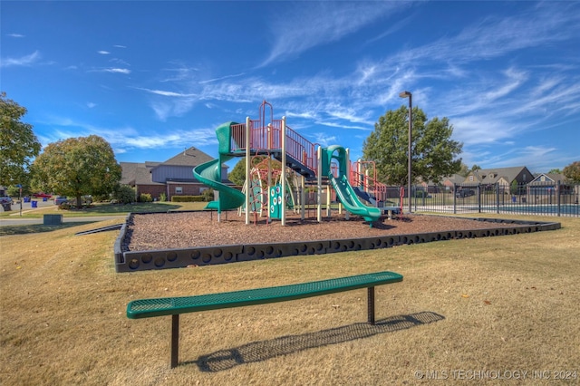 view of jungle gym with a yard