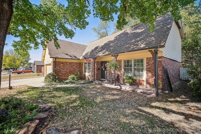 single story home with a garage