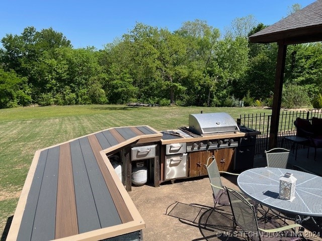 view of patio with area for grilling