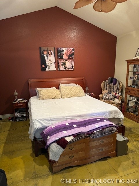 bedroom with lofted ceiling and ceiling fan