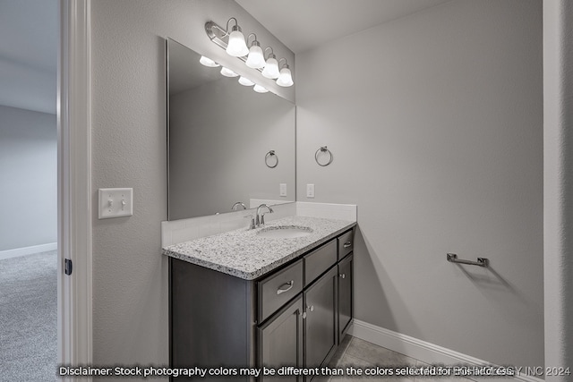 bathroom with vanity and tile patterned floors