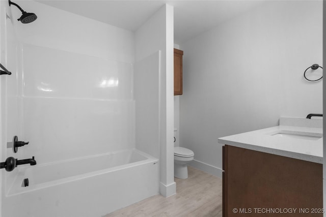 10804 S 274th Ave E, Coweta, OK 74429 - full bathroom featuring wood finished floors, vanity, toilet, shower / bathtub combination, and baseboards