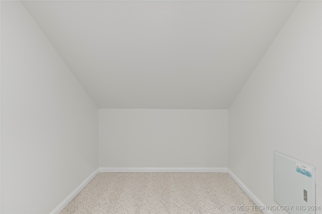 bonus room featuring carpet and lofted ceiling