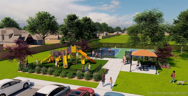 view of home's community with a playground and a lawn