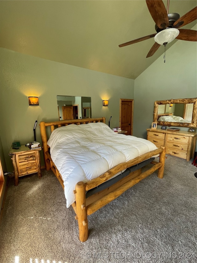 bedroom with vaulted ceiling, dark carpet, and ceiling fan