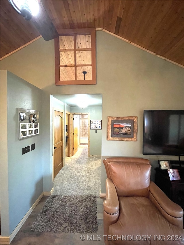 hall featuring carpet, high vaulted ceiling, and wooden ceiling