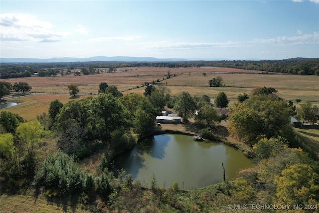 bird's eye view with a water and mountain view and a rural view