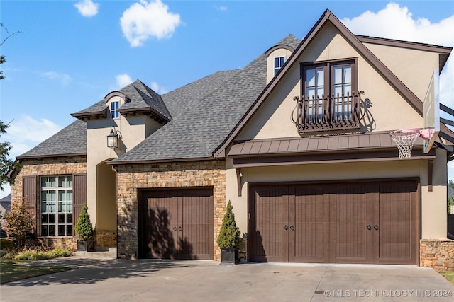 view of front of home with a garage