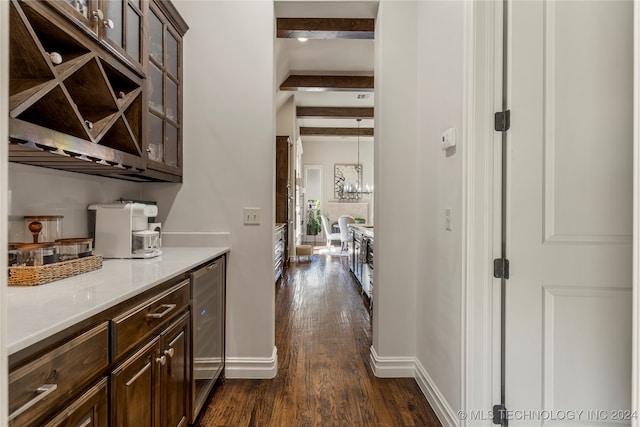 bar with beam ceiling, wine cooler, dark brown cabinetry, and dark hardwood / wood-style floors