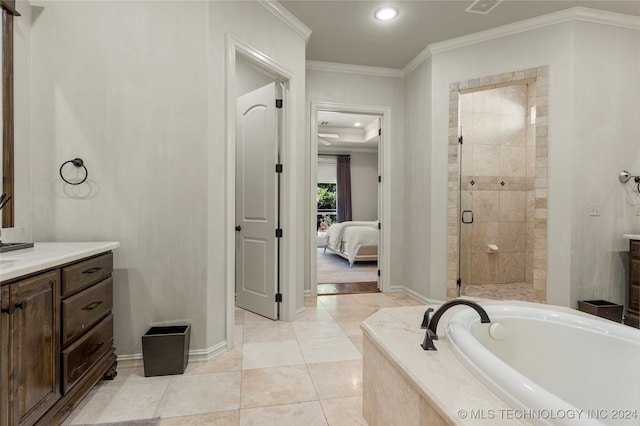 bathroom featuring vanity, tile patterned floors, independent shower and bath, and ornamental molding