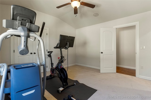 exercise area featuring lofted ceiling, carpet floors, and ceiling fan