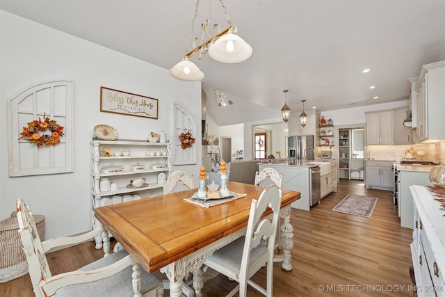 dining room with light hardwood / wood-style flooring