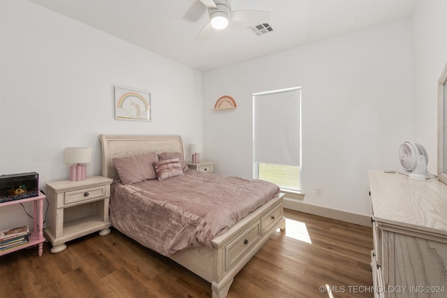 bedroom with hardwood / wood-style floors and ceiling fan