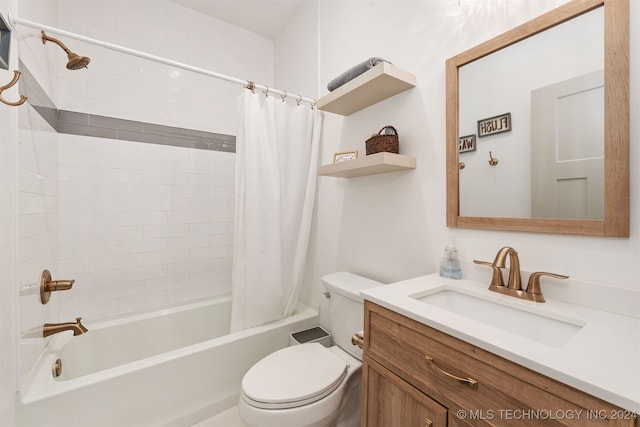 full bathroom with shower / bath combo with shower curtain, vanity, and toilet