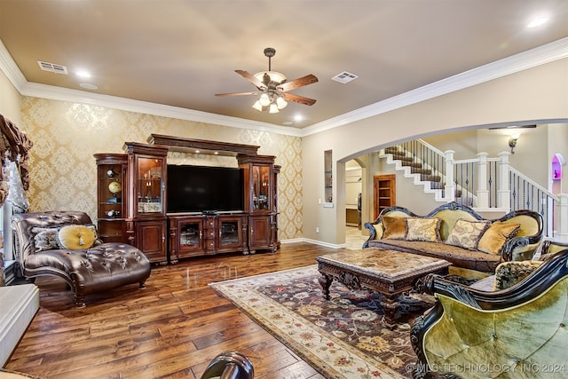 living room featuring ornamental molding, dark hardwood / wood-style floors, and ceiling fan