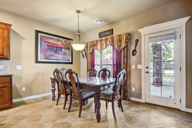 dining space with plenty of natural light