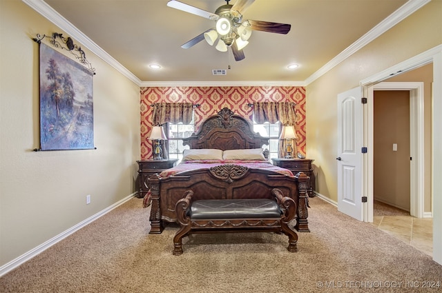 carpeted bedroom featuring ornamental molding and ceiling fan