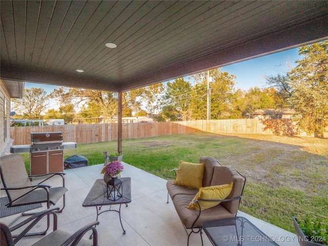 view of patio with a grill