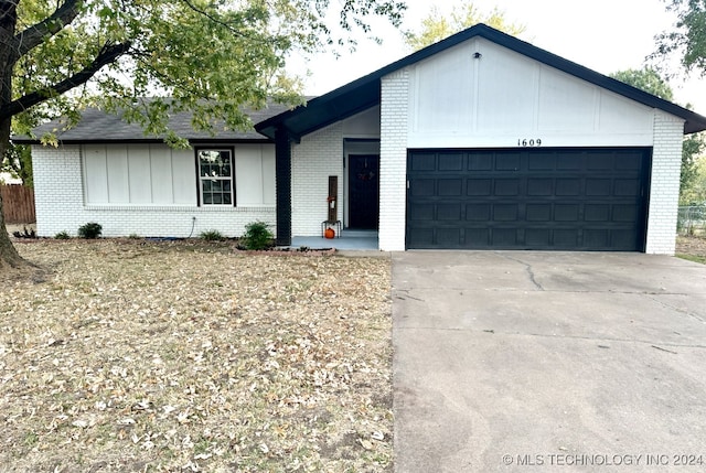 ranch-style home with a garage